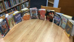 New chapter books lined up on a table in the Belmont Library Childrens Room.
